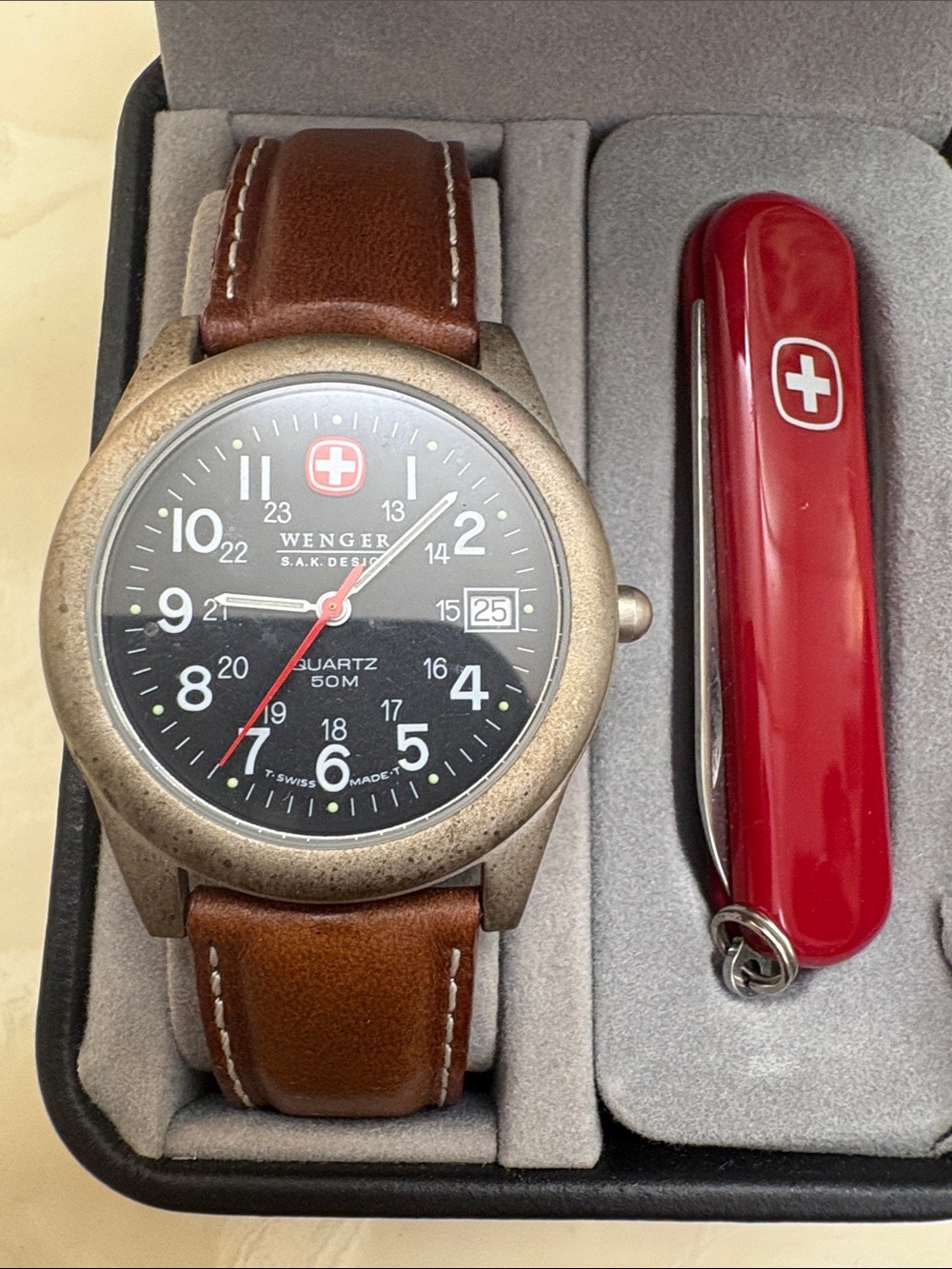 Wenger Black Dial Watch with Brown Leather Strap and Red Accents